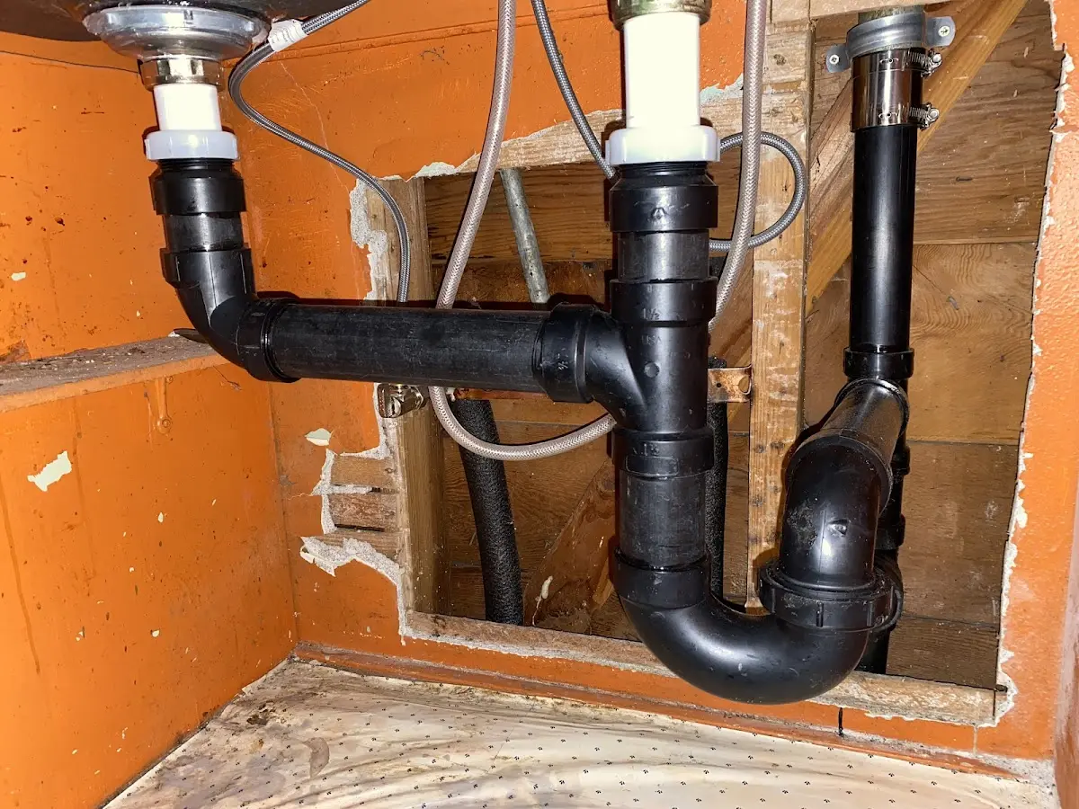Professional Garbage Disposal Repair equipment and tools on the job in Sault Ste. Marie